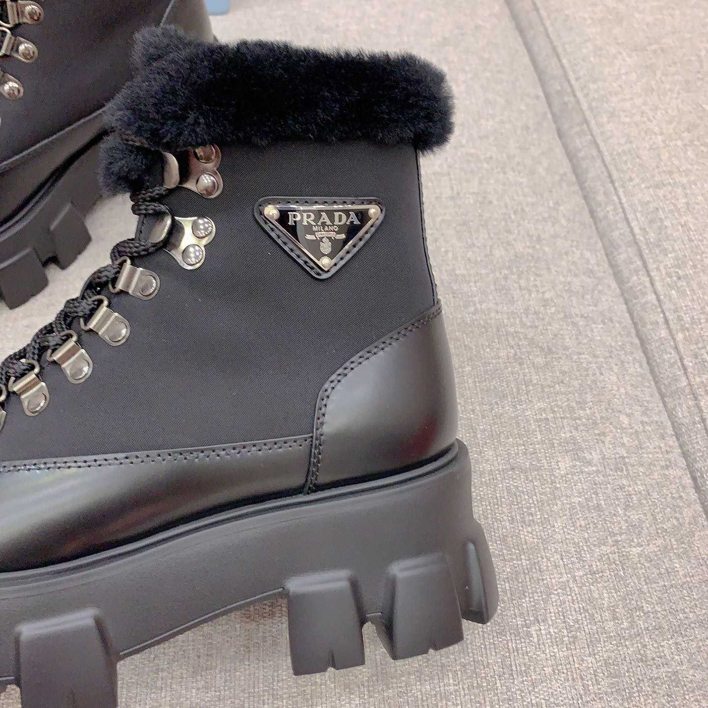 Prada Monolith Leather And Nylon Booties - FashionPlug