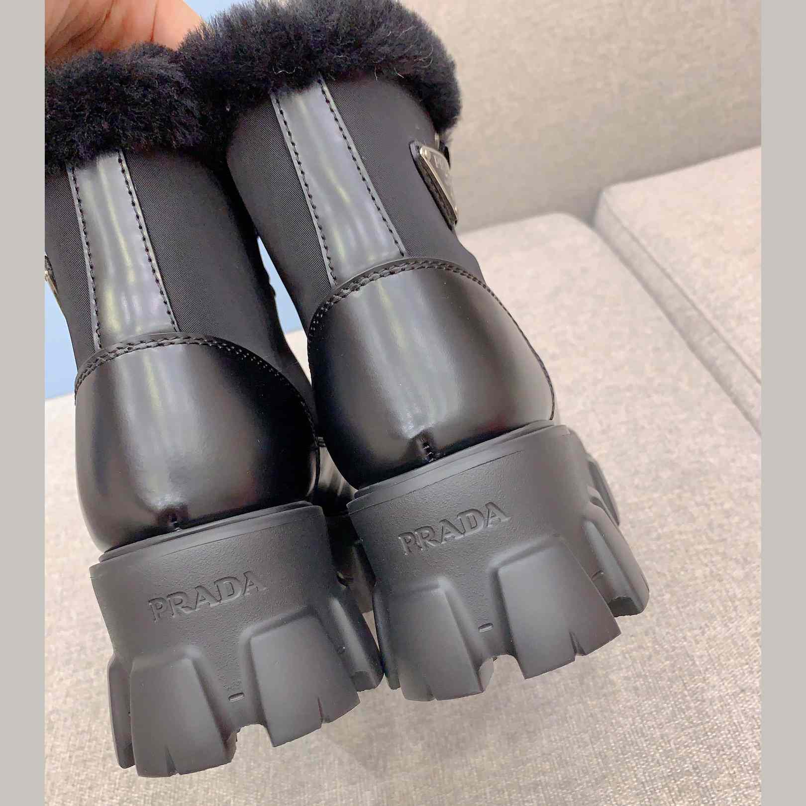 Prada Monolith Leather And Nylon Booties - FashionPlug