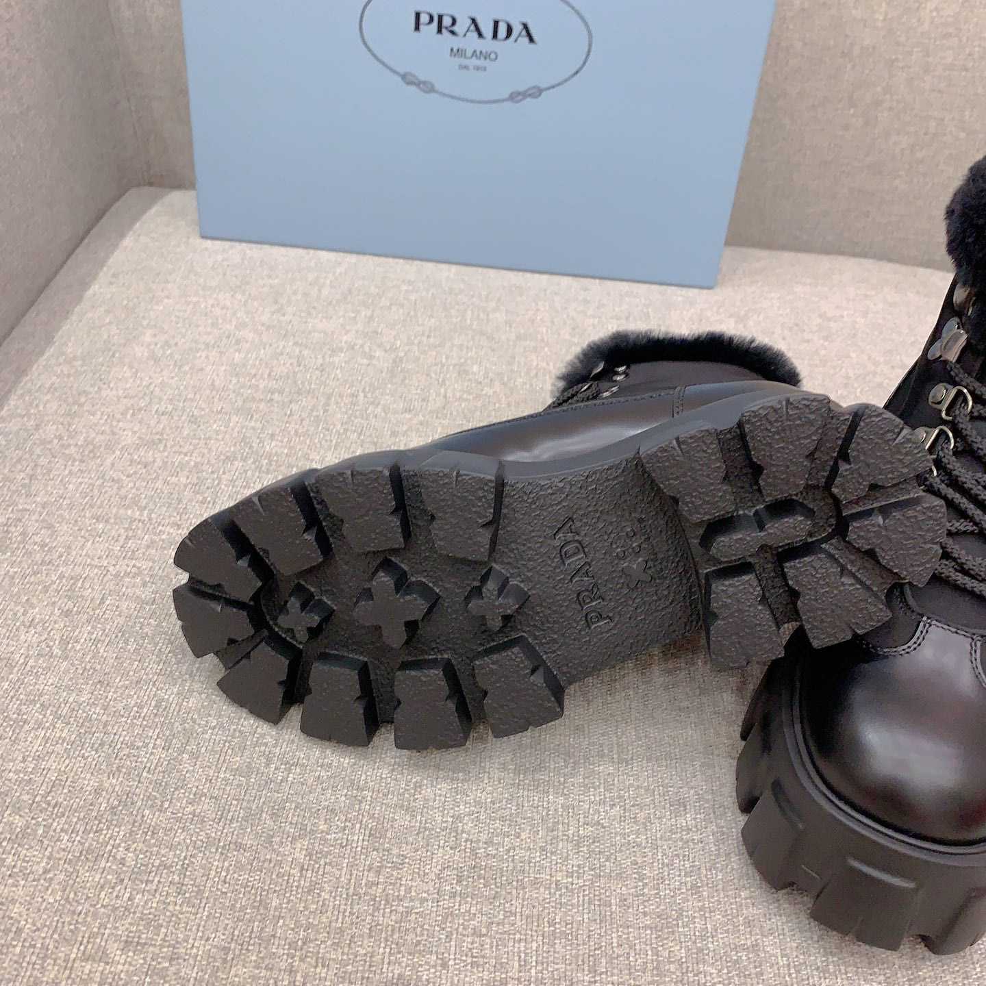 Prada Monolith Leather And Nylon Booties - FashionPlug