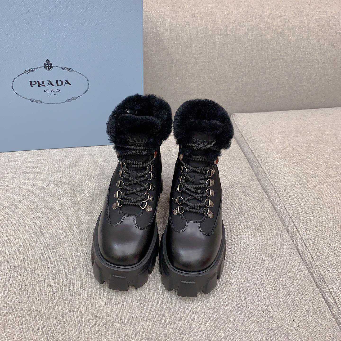 Prada Monolith Leather And Nylon Booties - FashionPlug