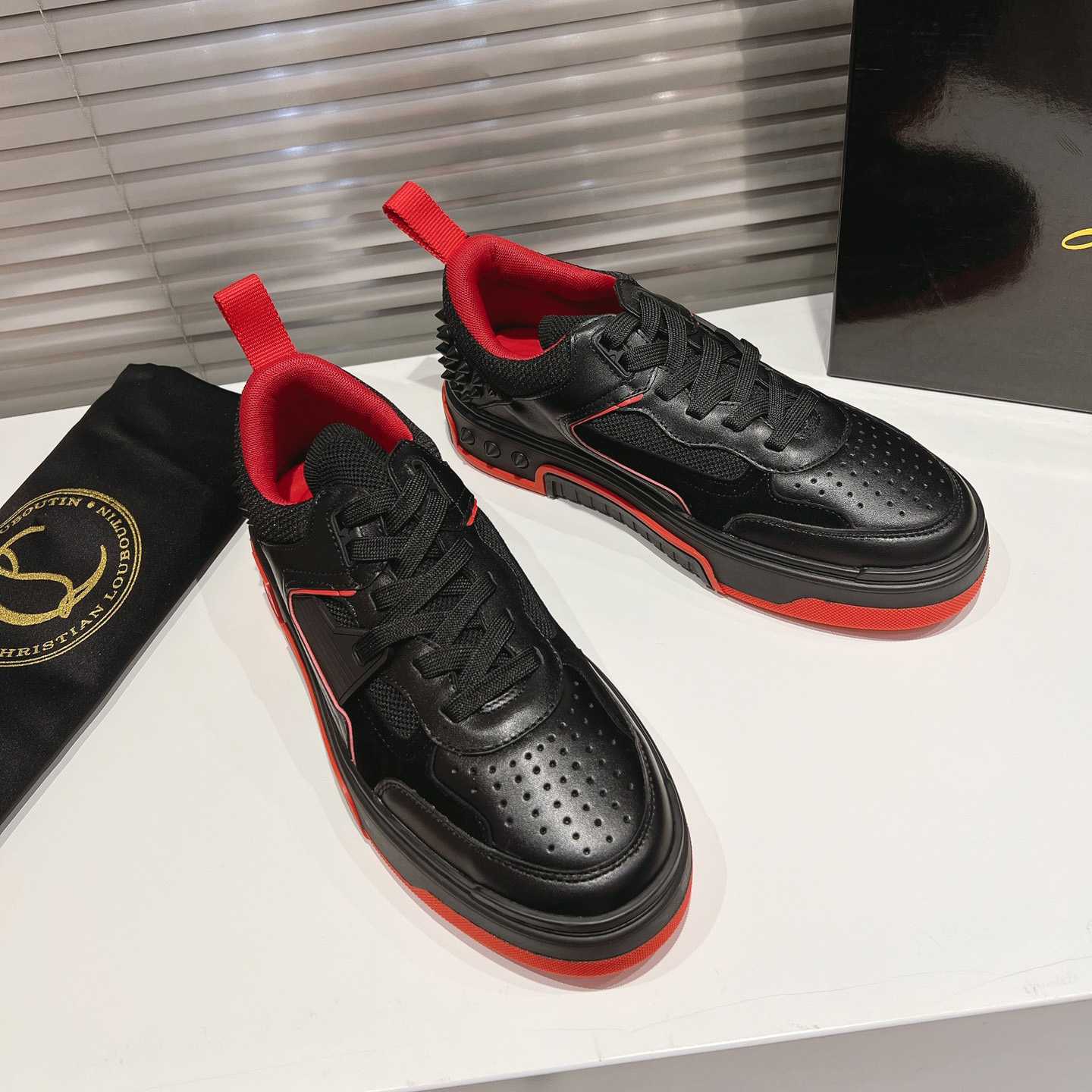 Christian Louboutin Astroloubi Sneakers - FashionPlug