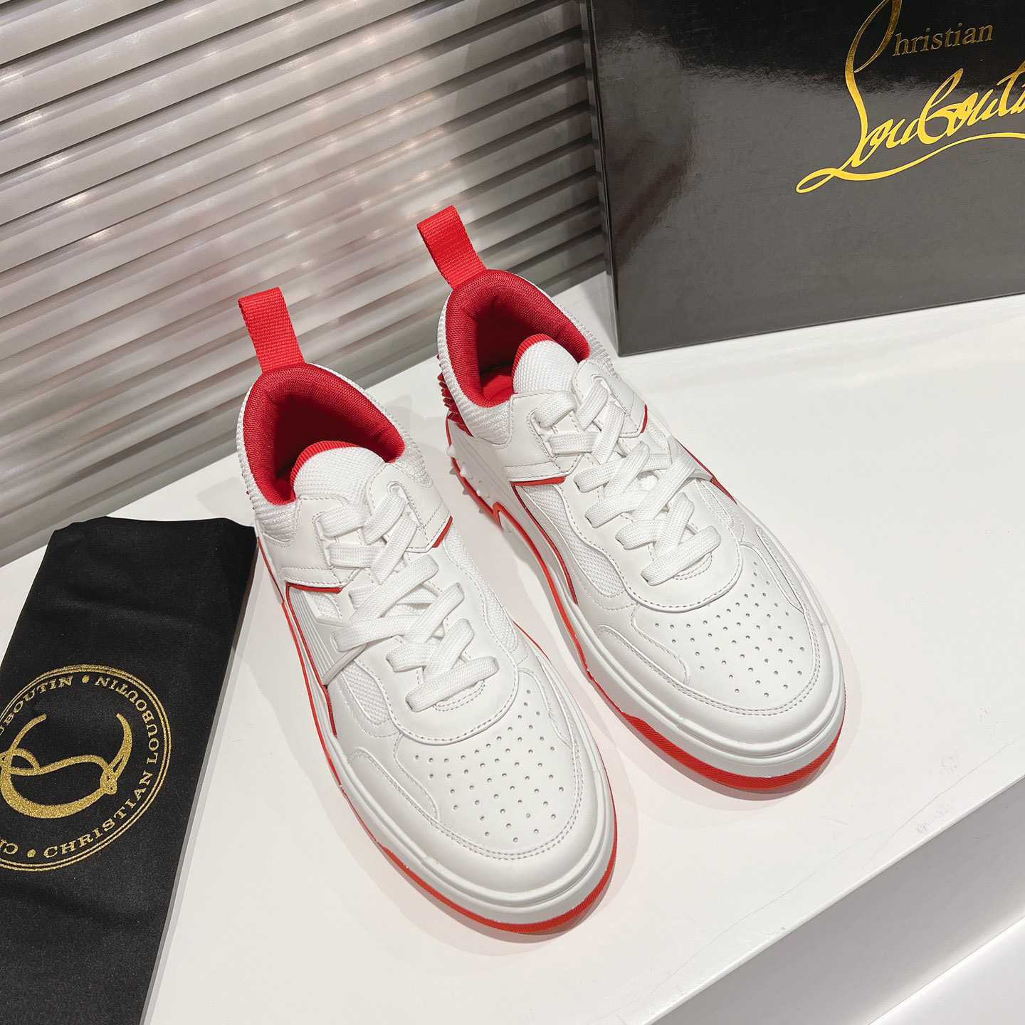 Christian Louboutin Astroloubi Sneakers - FashionPlug