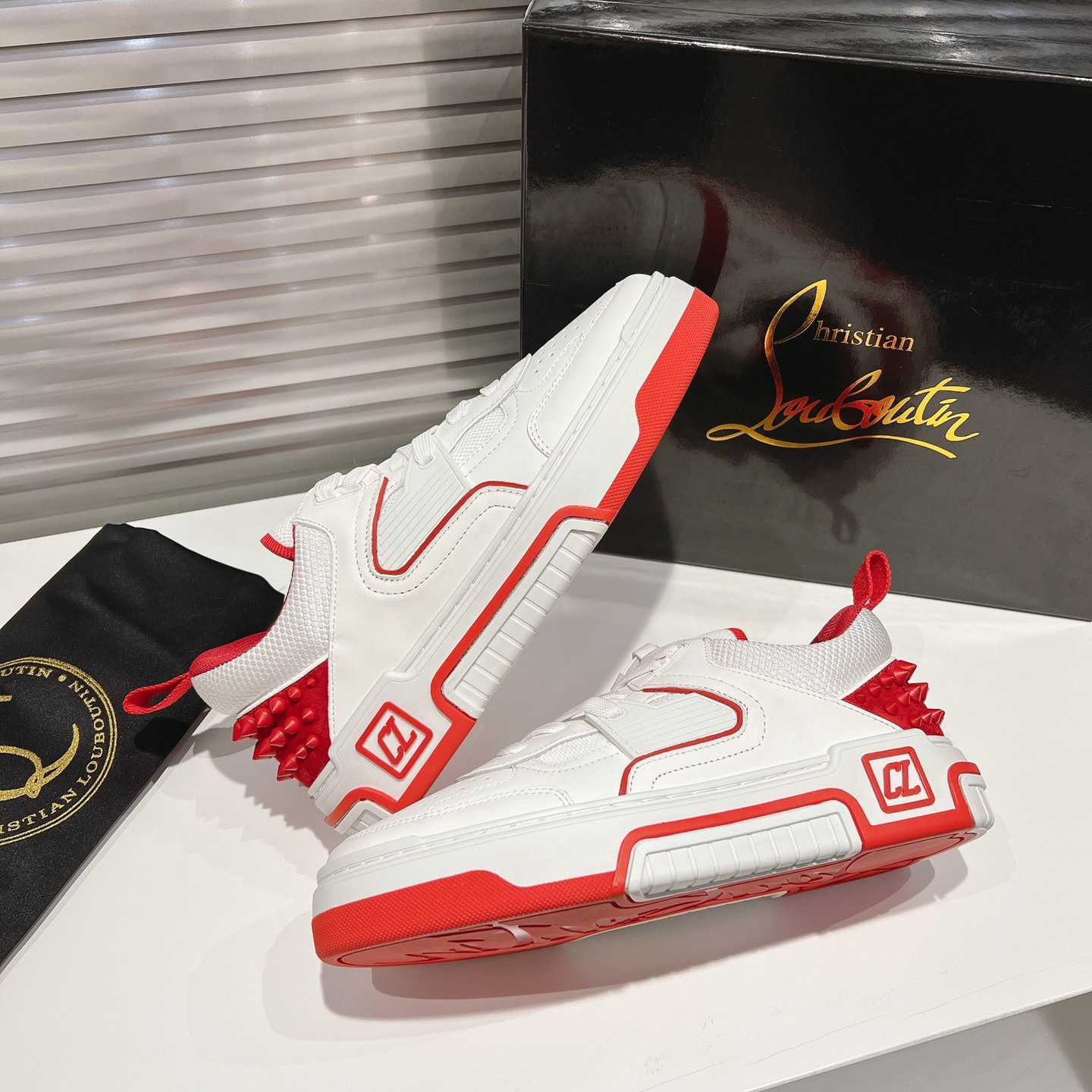Christian Louboutin Astroloubi Sneakers - FashionPlug