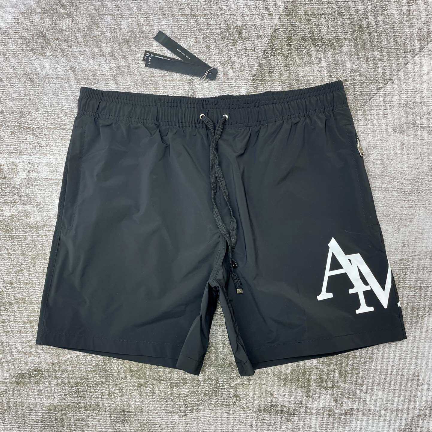 Amiri Staggered Swim Trunk - FashionPlug