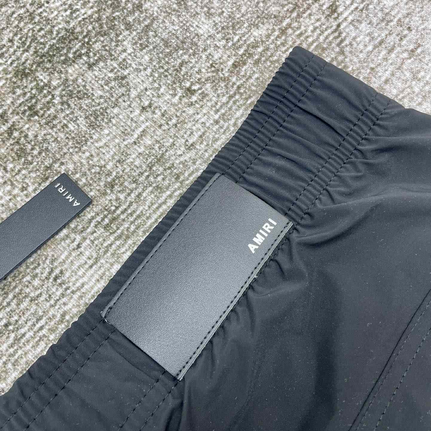 Amiri Staggered Swim Trunk - FashionPlug