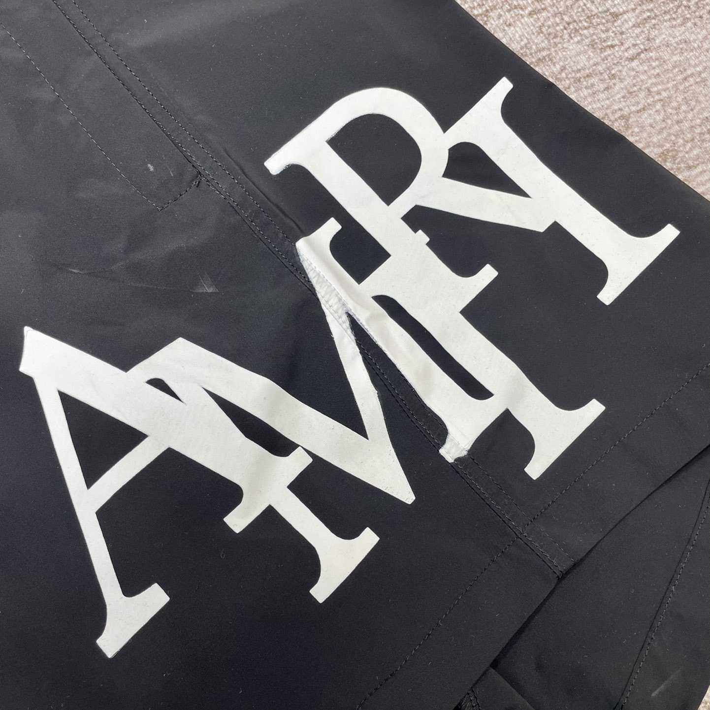 Amiri Staggered Swim Trunk - FashionPlug