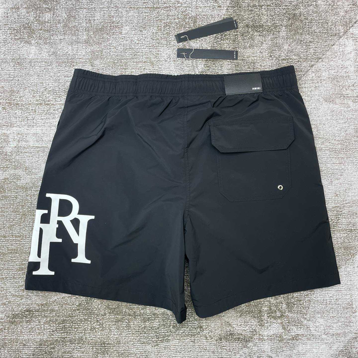 Amiri Staggered Swim Trunk - FashionPlug