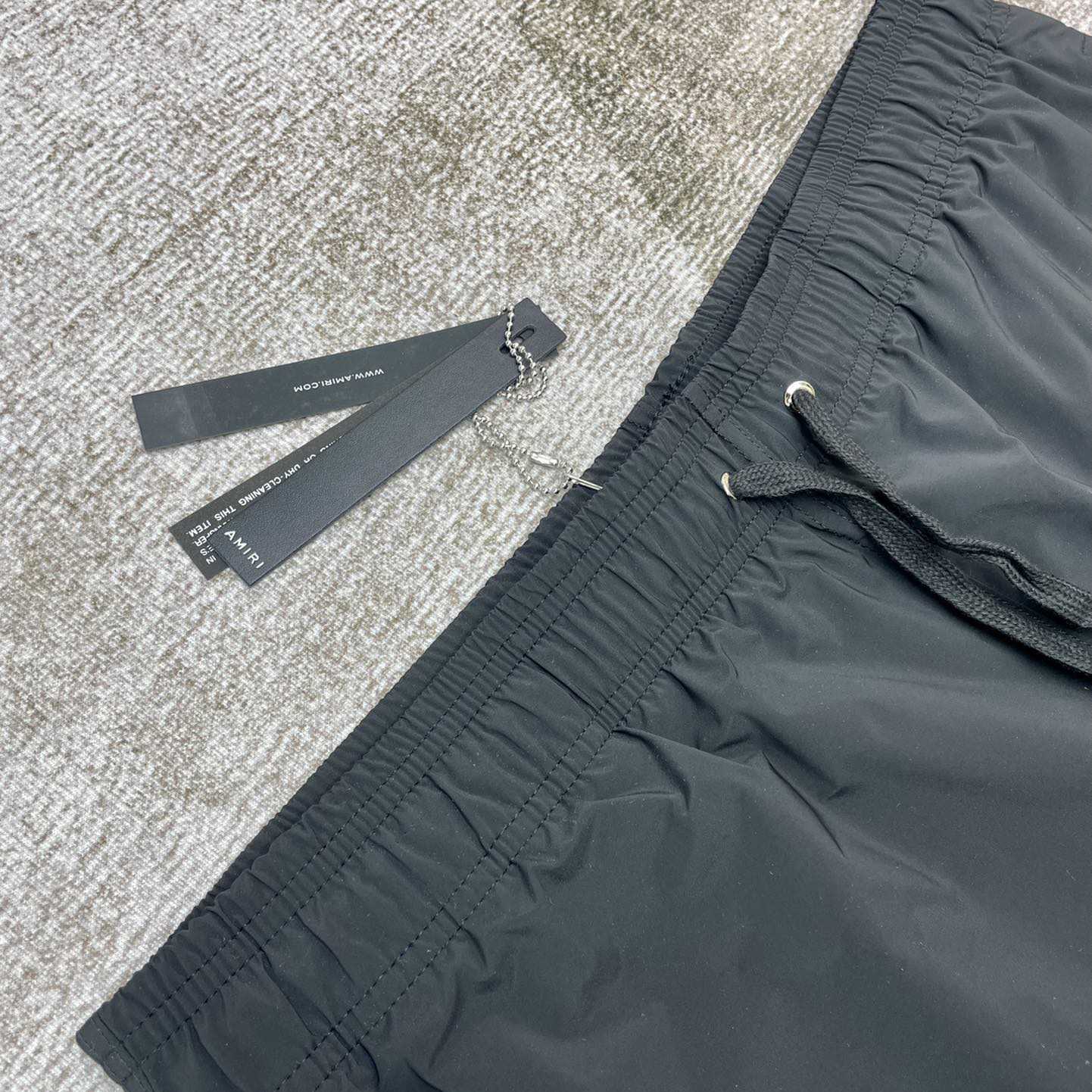 Amiri Staggered Swim Trunk - FashionPlug