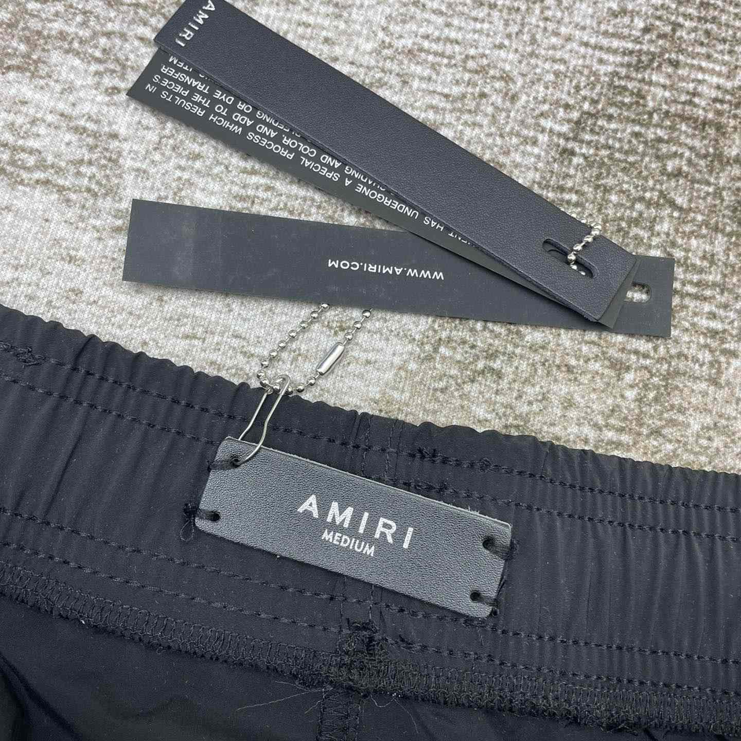 Amiri Staggered Swim Trunk - FashionPlug