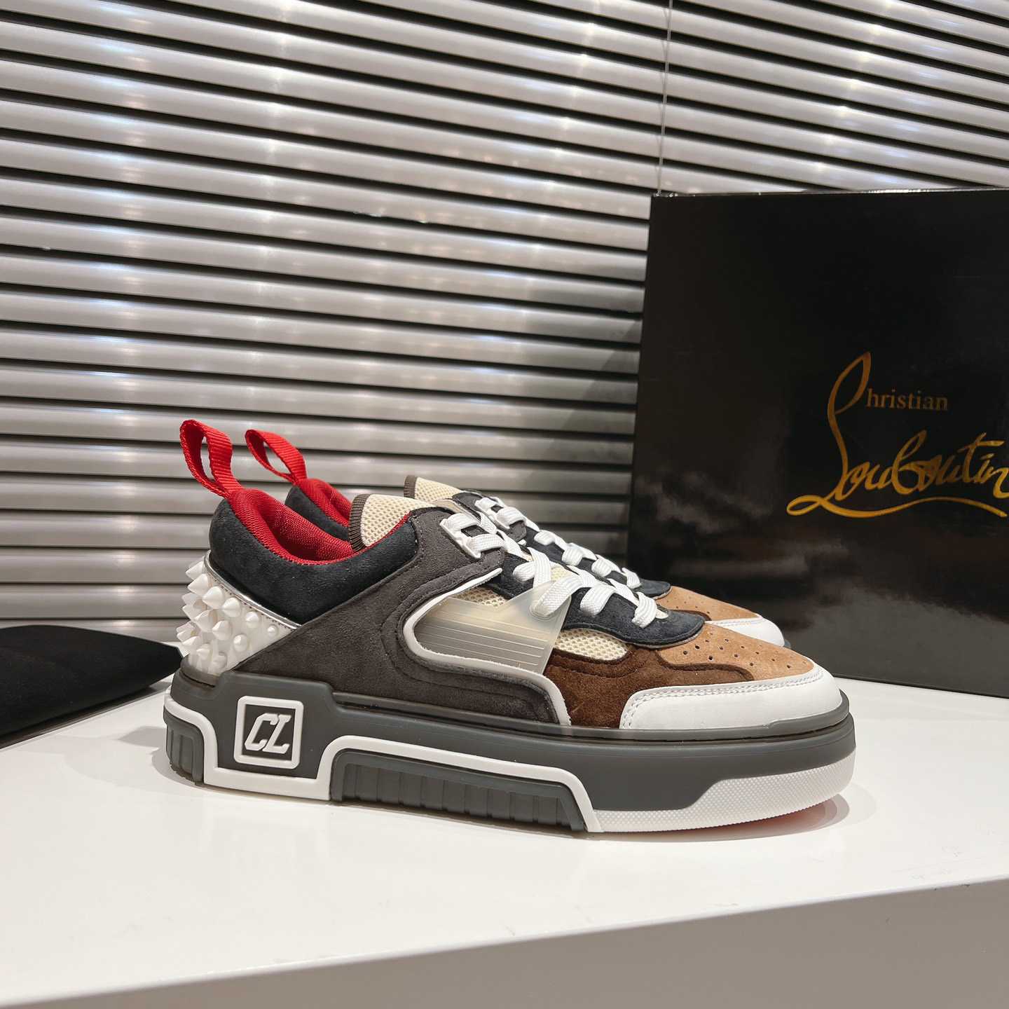 Christian Louboutin Astroloubi Sneakers - FashionPlug