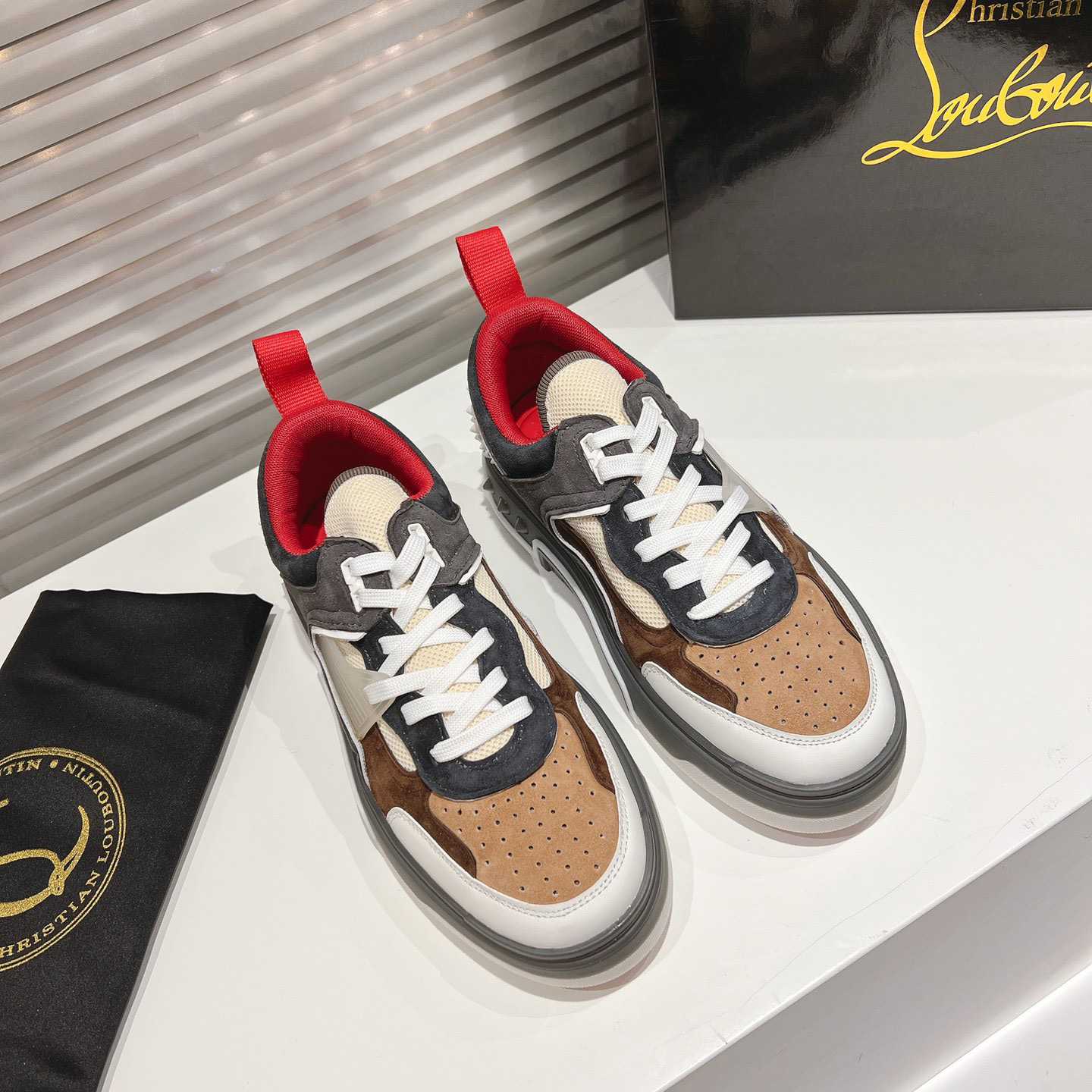 Christian Louboutin Astroloubi Sneakers - FashionPlug