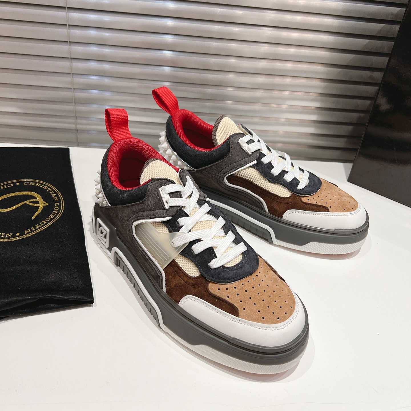 Christian Louboutin Astroloubi Sneakers - FashionPlug