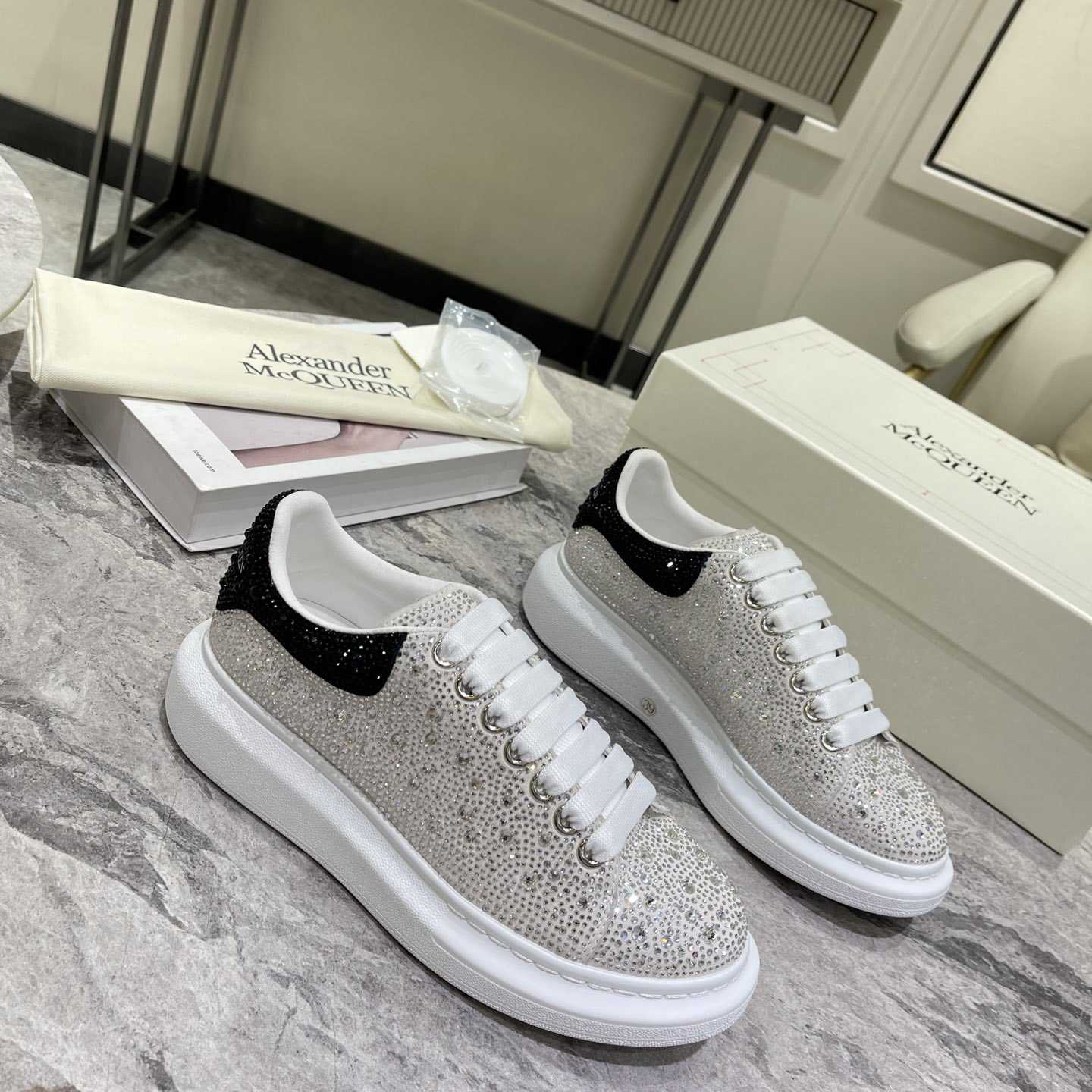 Alexander Mqueen Crystal-embellished Oversized Sneaker In White/Black - FashionPlug