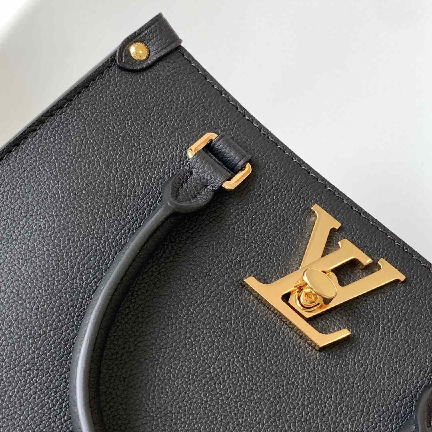 Louis Vuitton Lock & Go Handbag    M22311 - FashionPlug