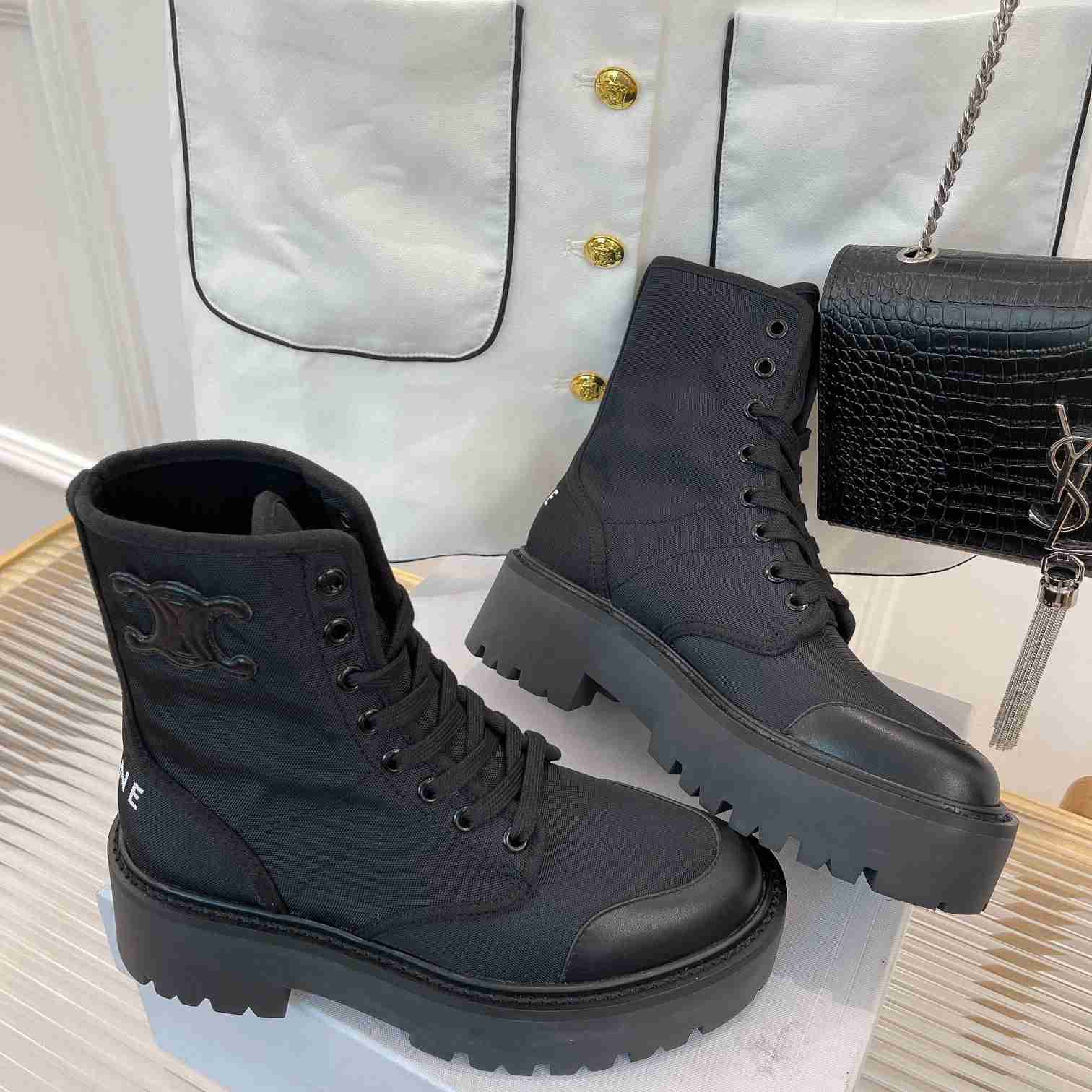 Celine Bulky Laced Up Boot In Nylon And Shiny Bull - FashionPlug
