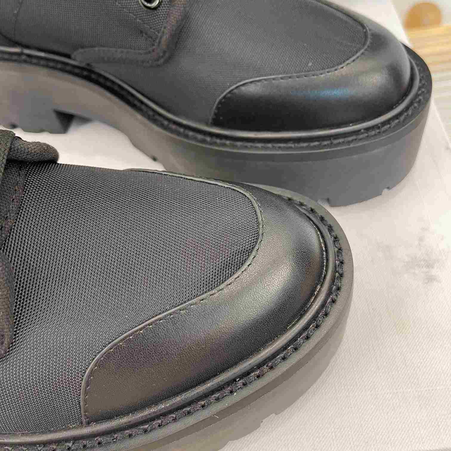Celine Bulky Laced Up Boot In Nylon And Shiny Bull - FashionPlug