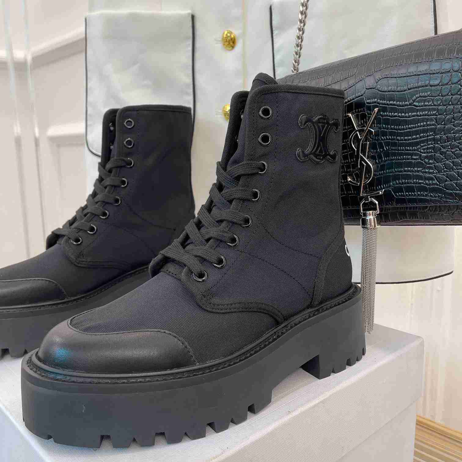 Celine Bulky Laced Up Boot In Nylon And Shiny Bull - FashionPlug