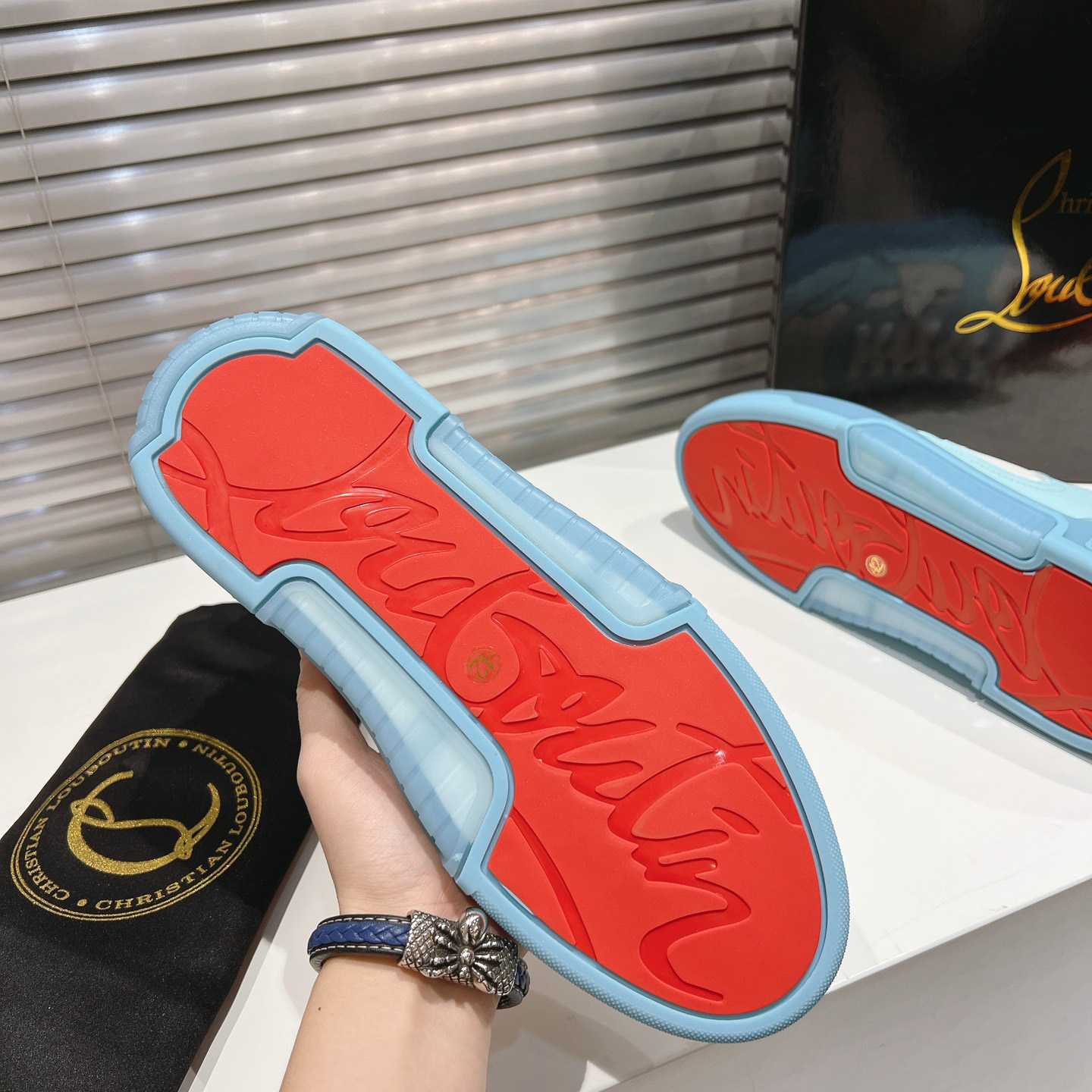 Christian Louboutin Astroloubi Sneakers - FashionPlug