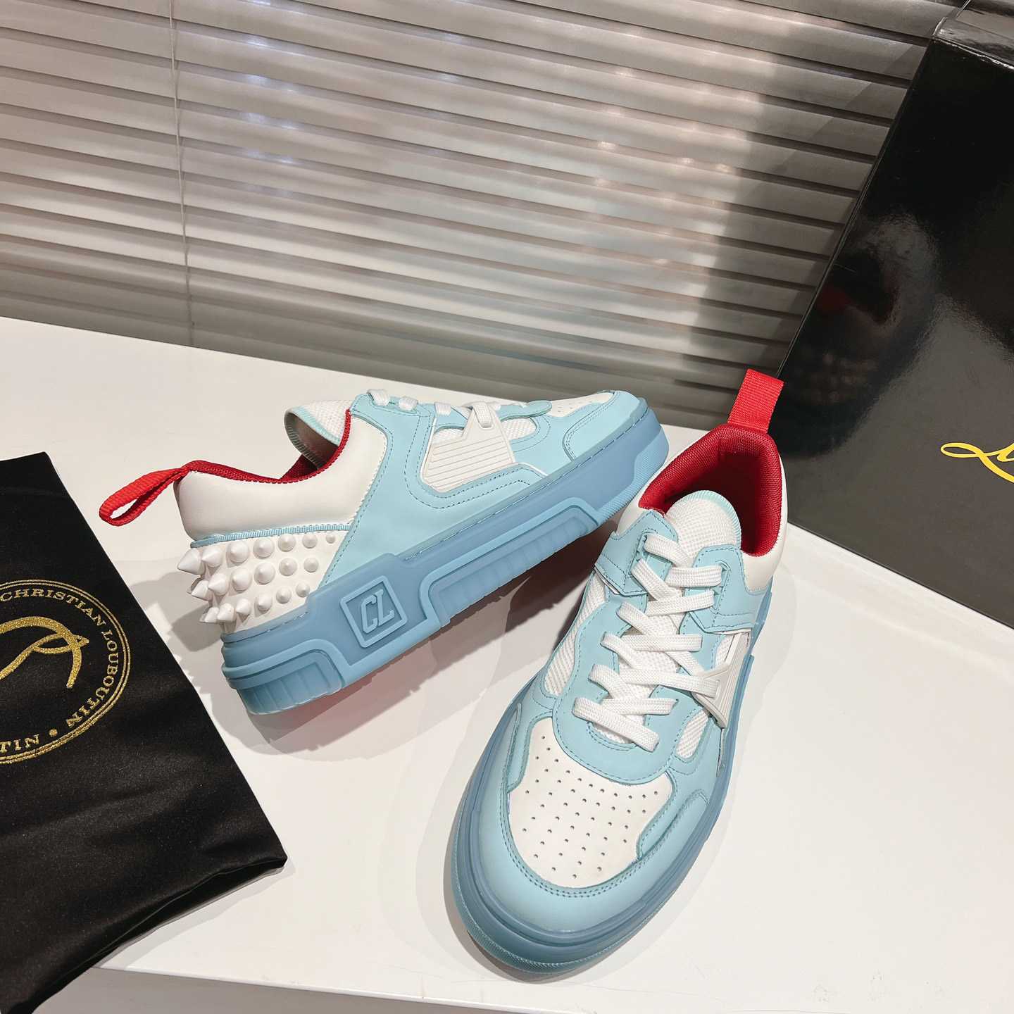 Christian Louboutin Astroloubi Sneakers - FashionPlug