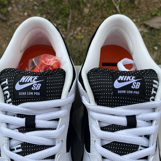 Tightbooth x Nike SB Dunk Low Sneaker      FD2629-100 - FashionPlug