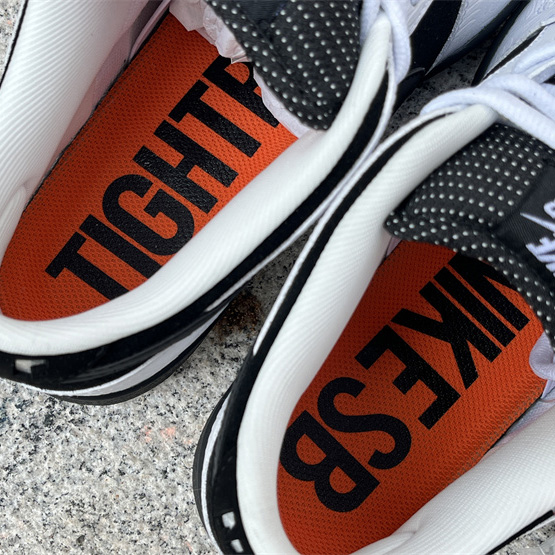 Tightbooth x Nike SB Dunk Low Sneaker      FD2629-100 - FashionPlug