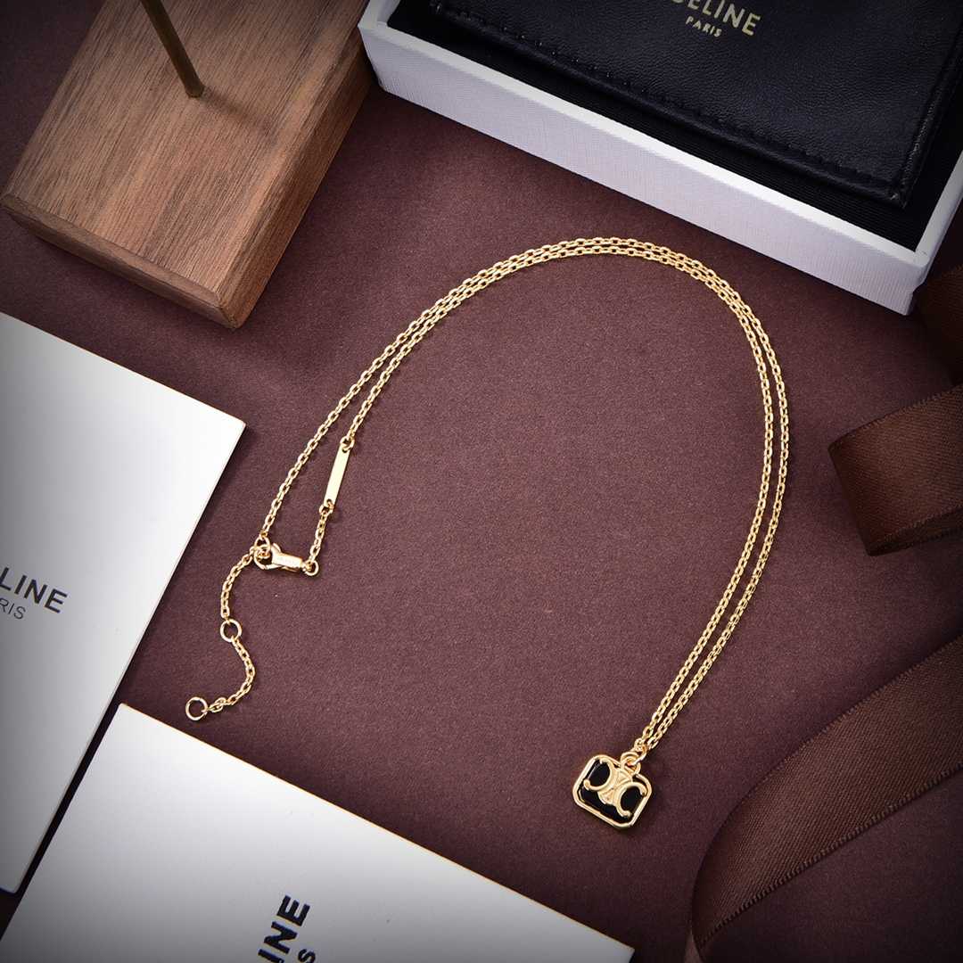 Celine Triomphe Indie Small Charms Necklace In Brass With Gold Finish And Nero Assoluto - FashionPlug