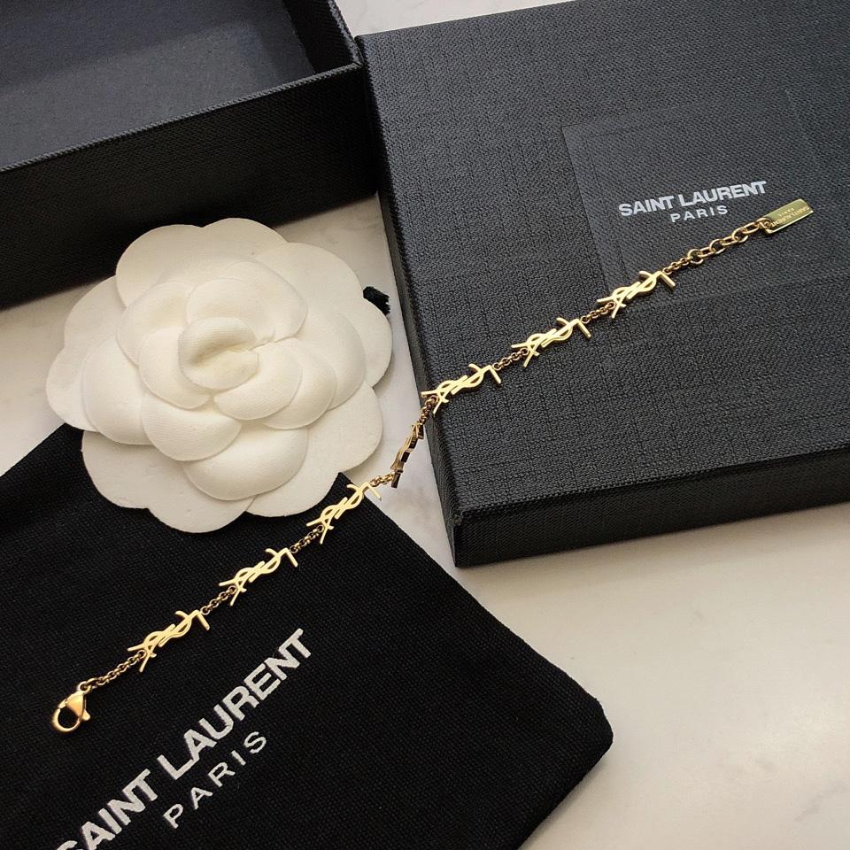 Saint Laurent Cassandre Multi-charm Bracelet In Metal - FashionPlug