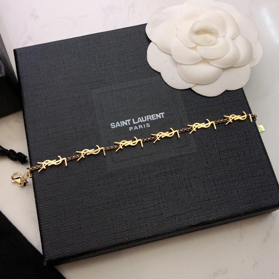 Saint Laurent Cassandre Multi-charm Bracelet In Metal - FashionPlug