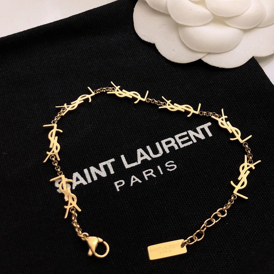 Saint Laurent Cassandre Multi-charm Bracelet In Metal - FashionPlug