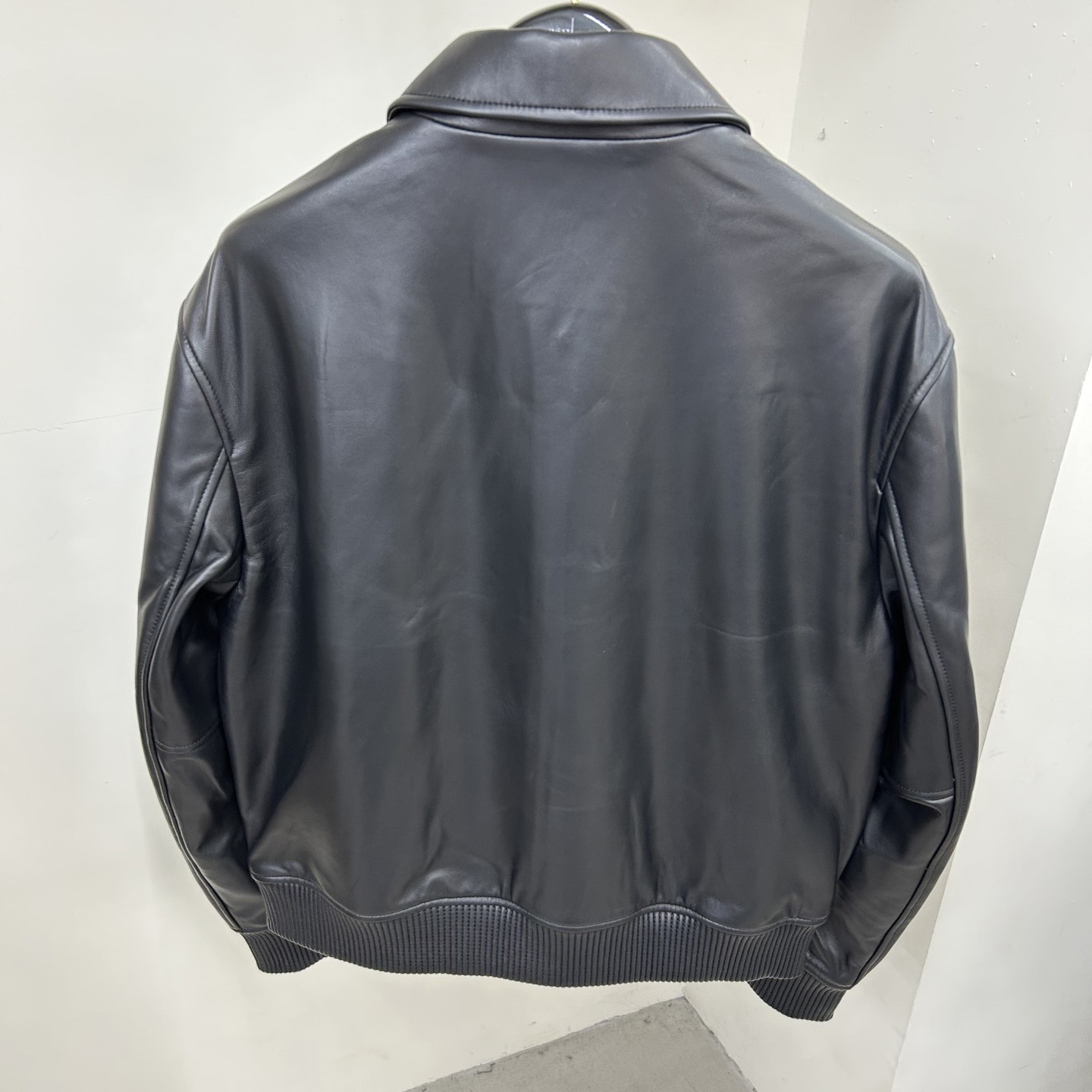 Givenchy Studded-logo Leather Jacket - FashionPlug