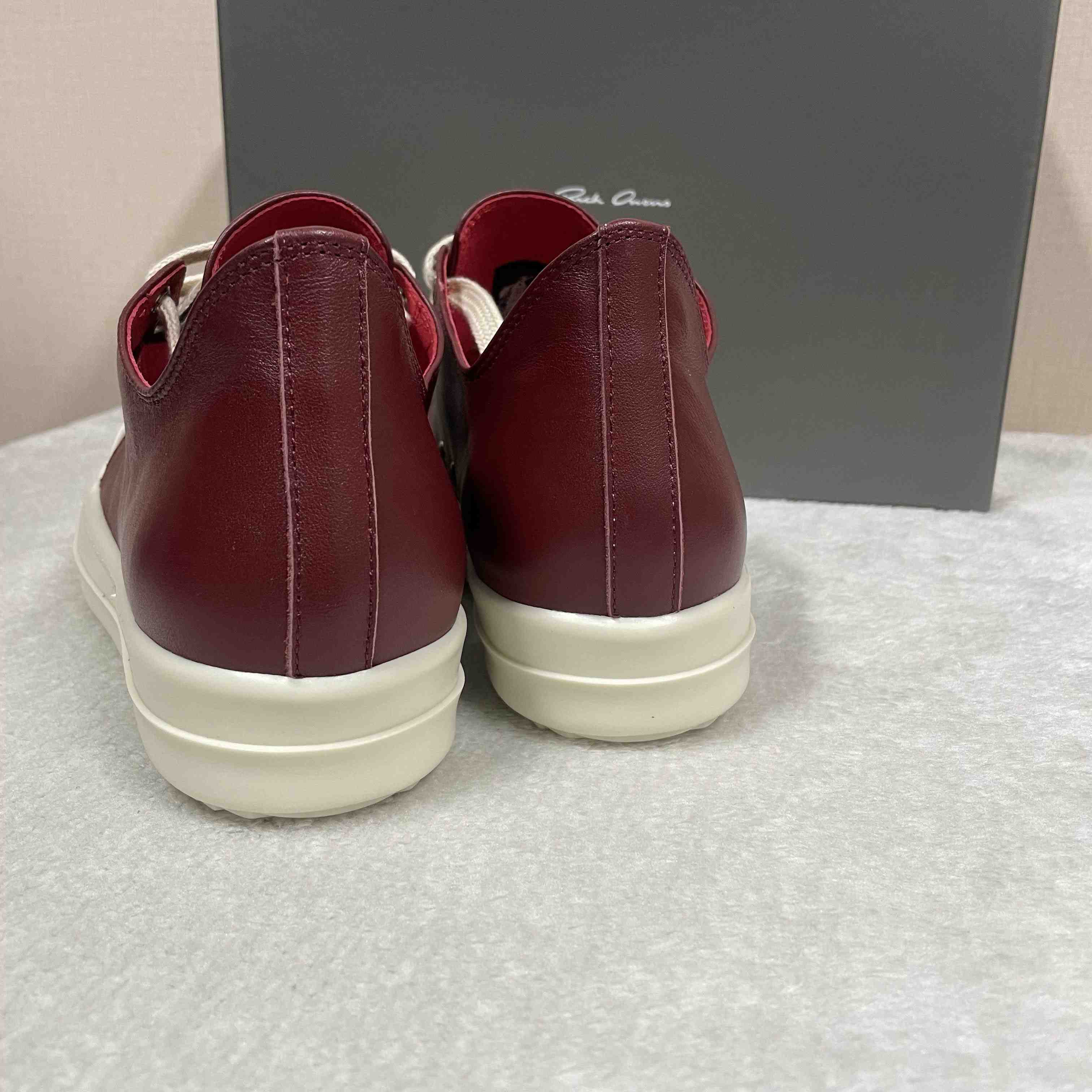 Rick Owens Low-Top Leather Sneakers - FashionPlug