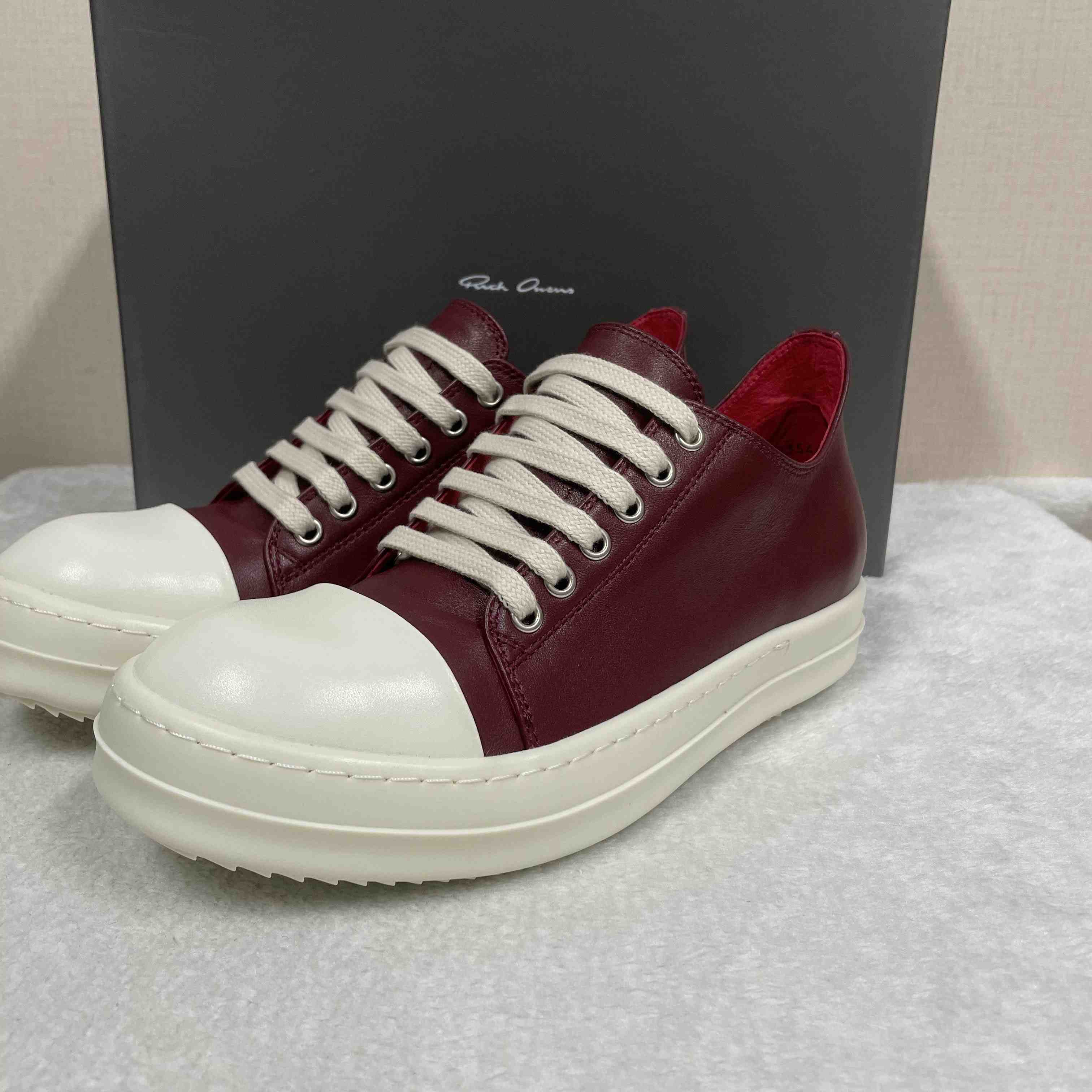 Rick Owens Low-Top Leather Sneakers - FashionPlug