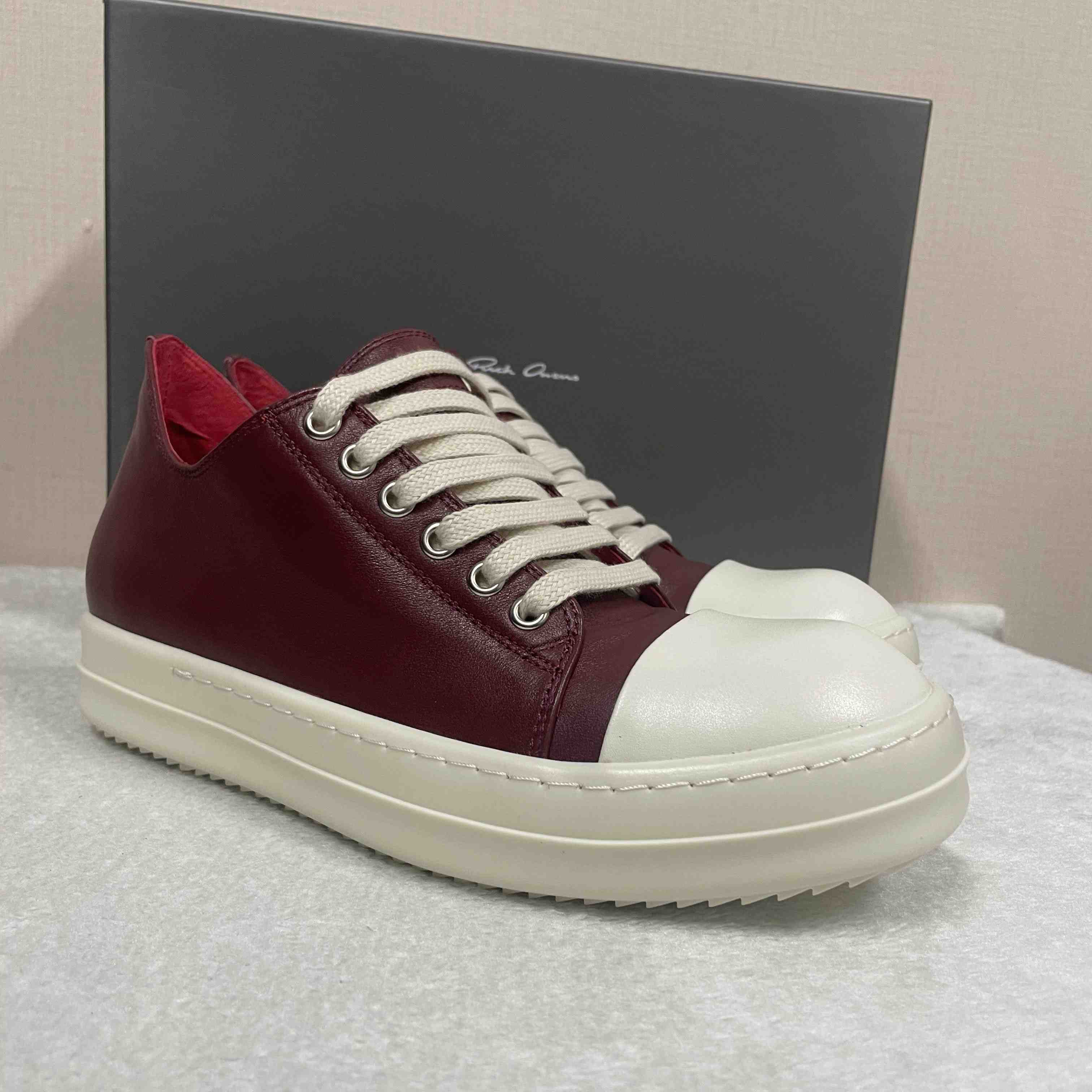 Rick Owens Low-Top Leather Sneakers - FashionPlug