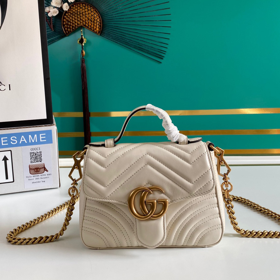 Gucci GG Marmont Mini Top Handle Bag - FashionPlug