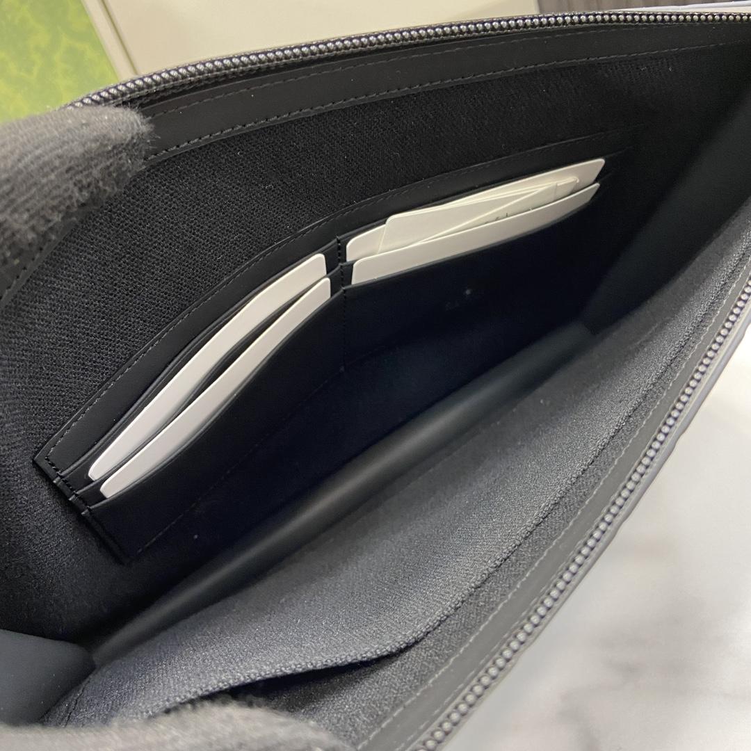 Gucci GG Rubber-effect Pouch - FashionPlug