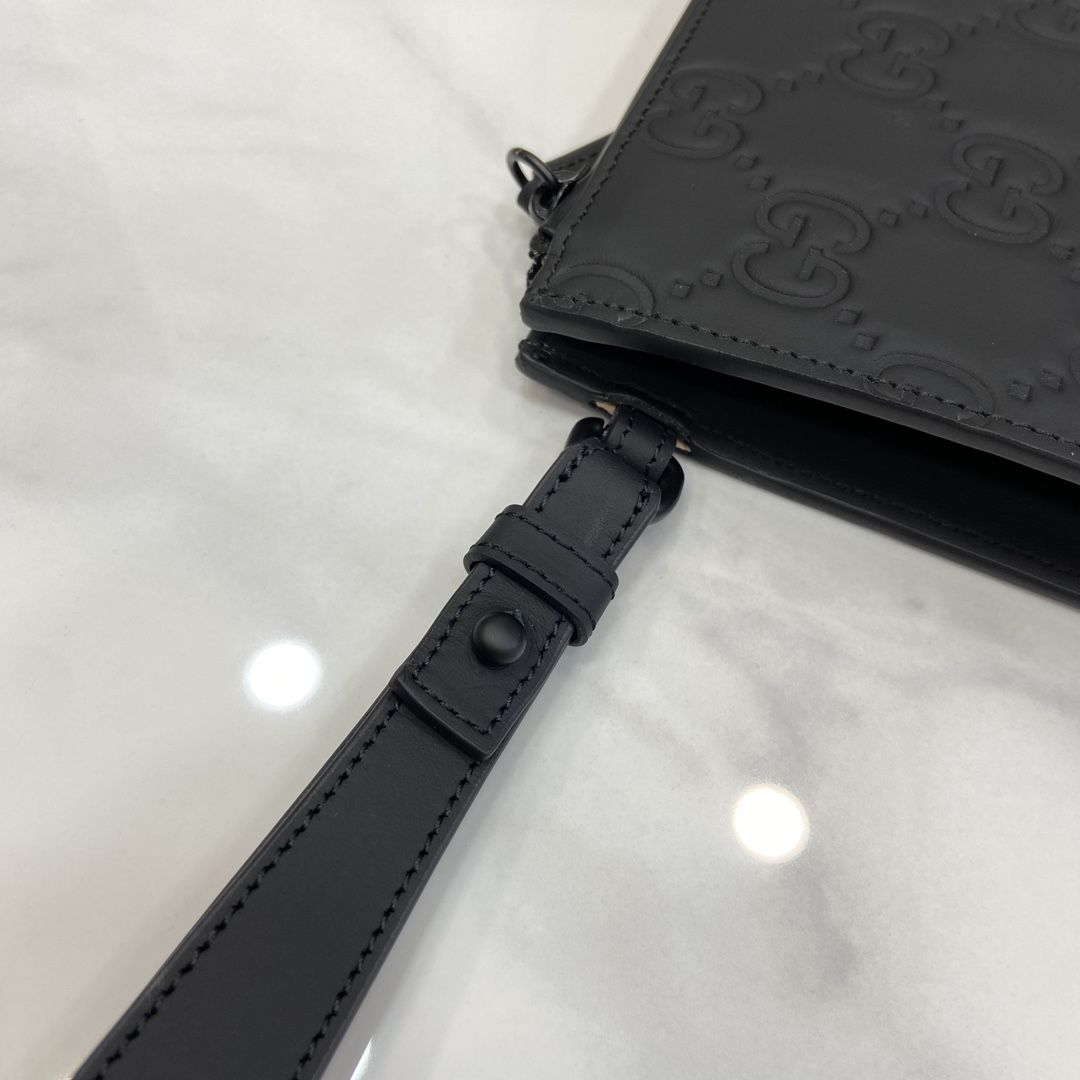 Gucci GG Rubber-effect Pouch - FashionPlug