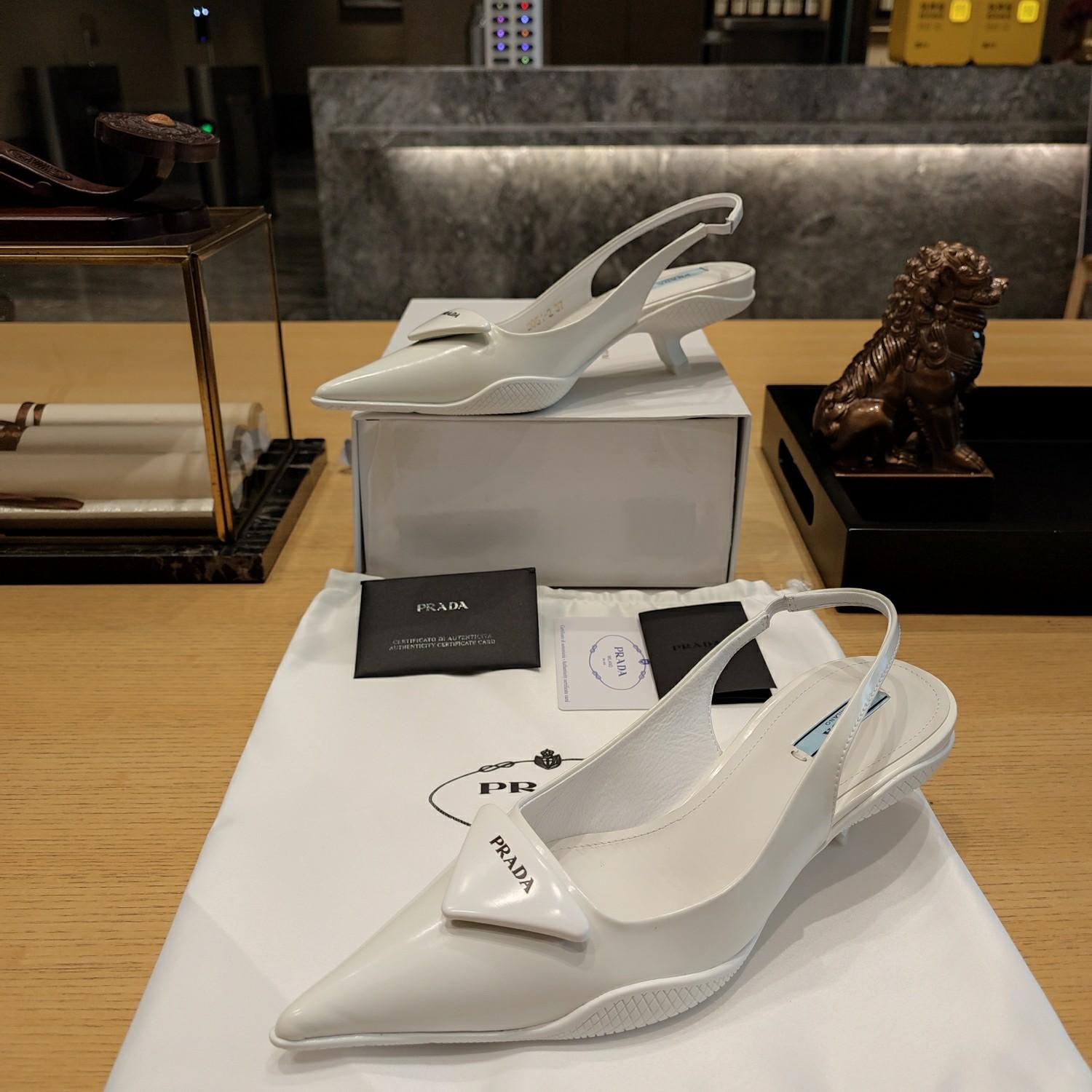 Prada Leather Slingback Pumps - FashionPlug