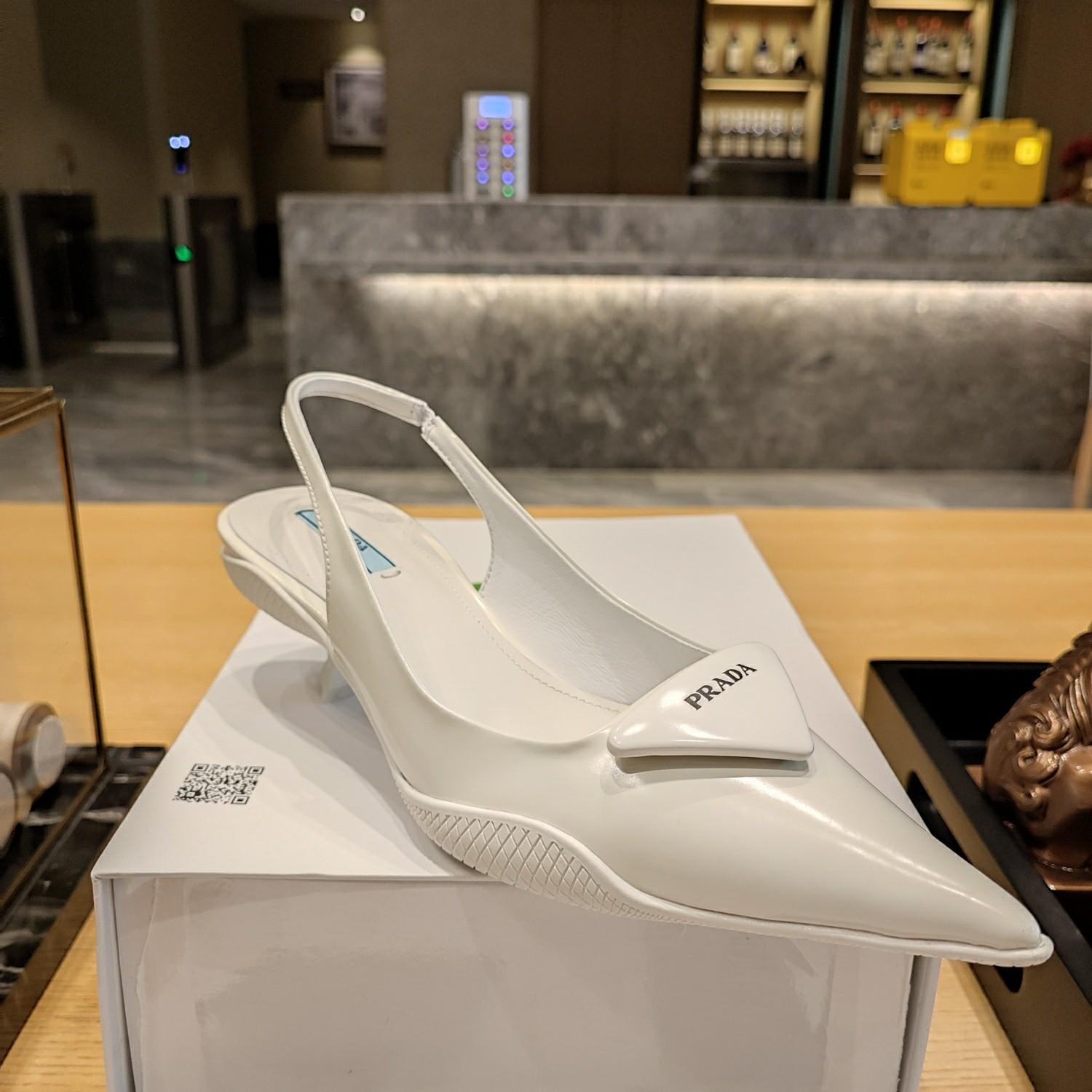 Prada Leather Slingback Pumps - FashionPlug