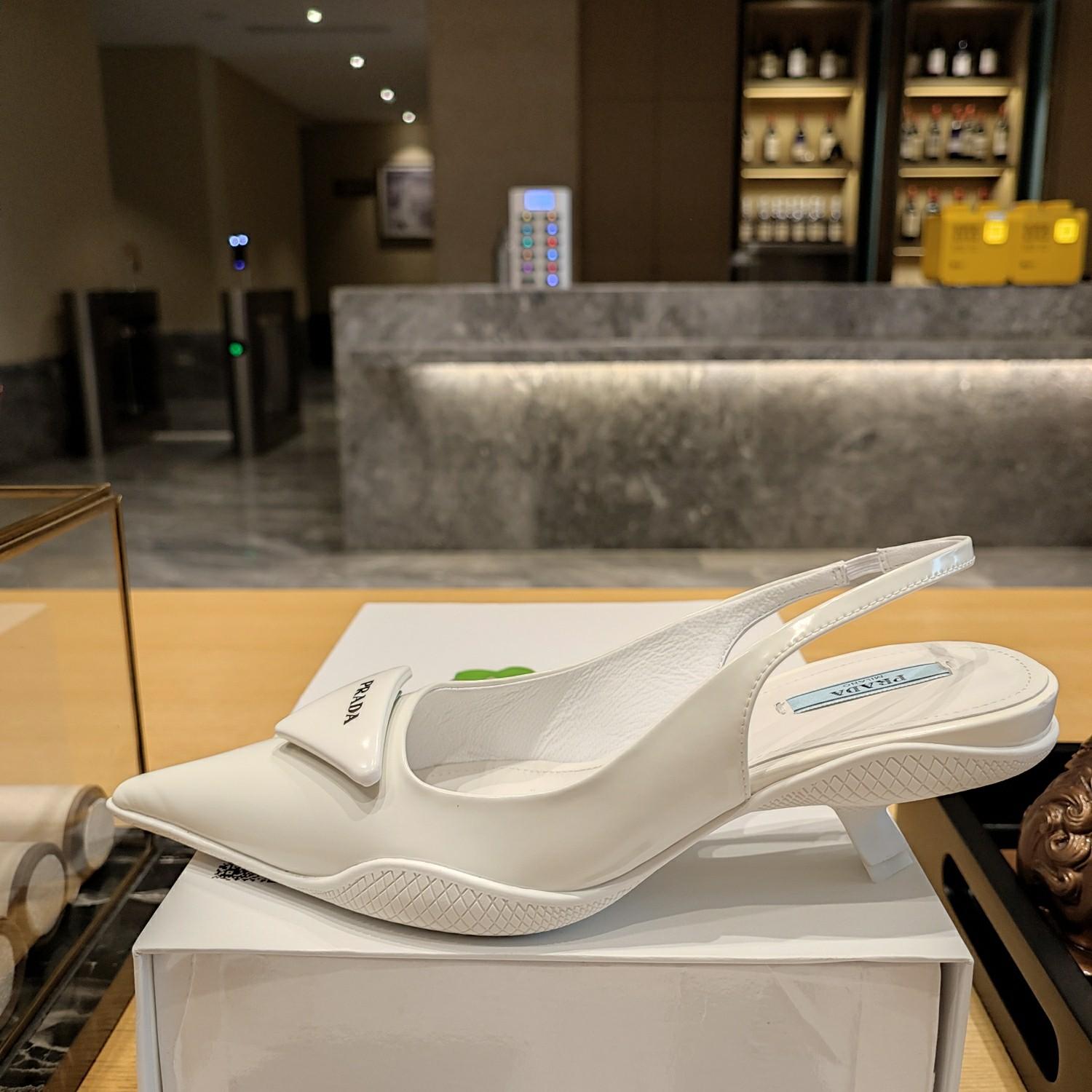 Prada Leather Slingback Pumps - FashionPlug