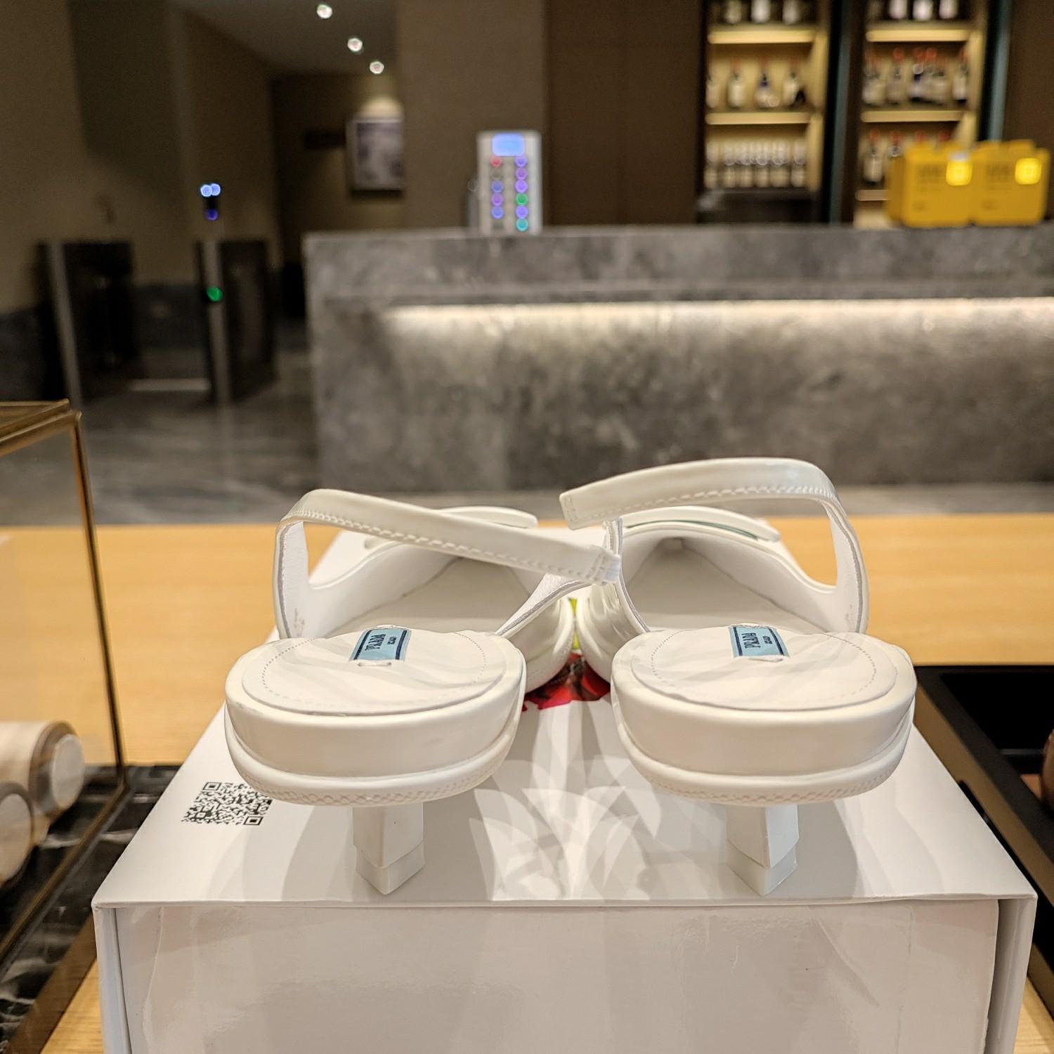 Prada Leather Slingback Pumps - FashionPlug