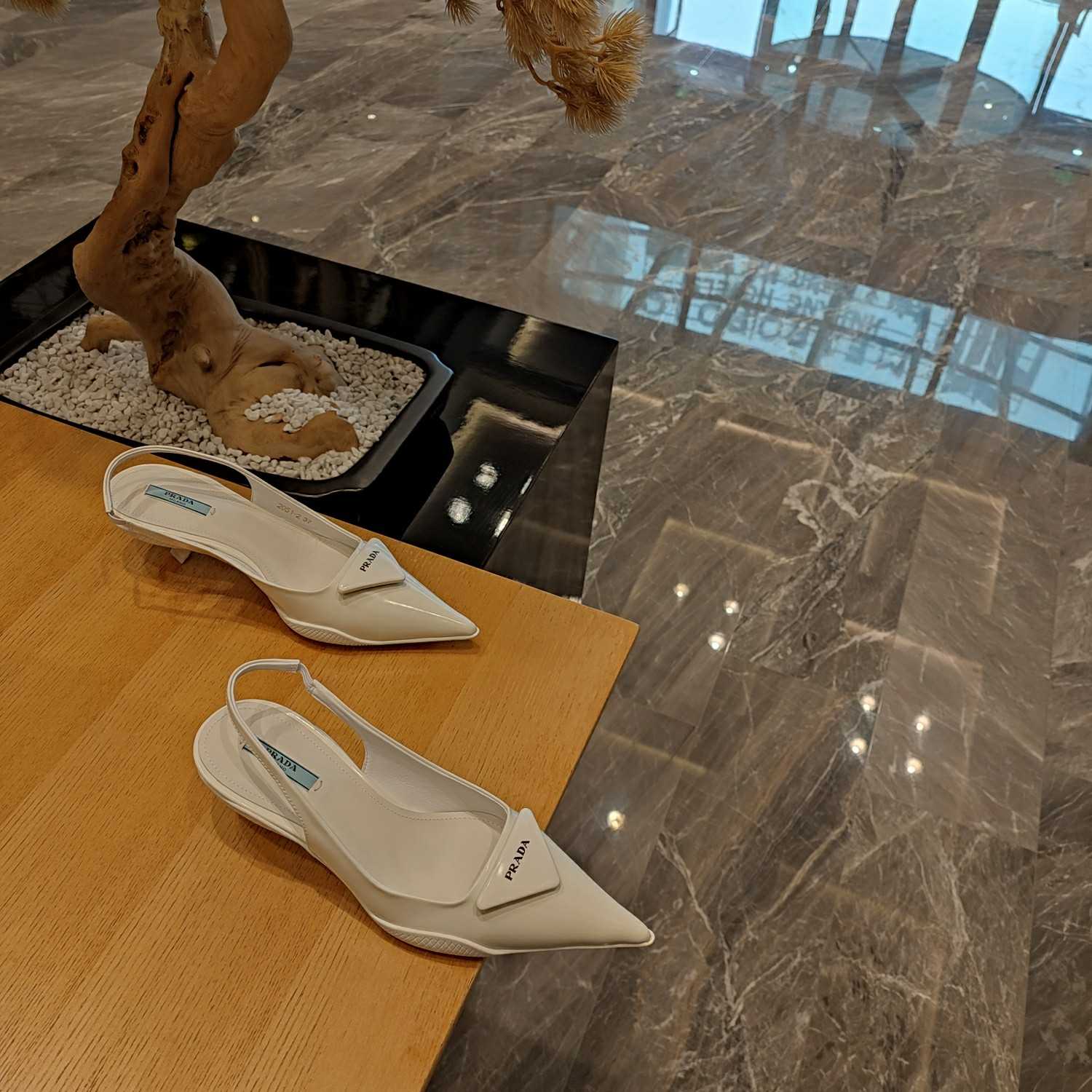 Prada Leather Slingback Pumps - FashionPlug
