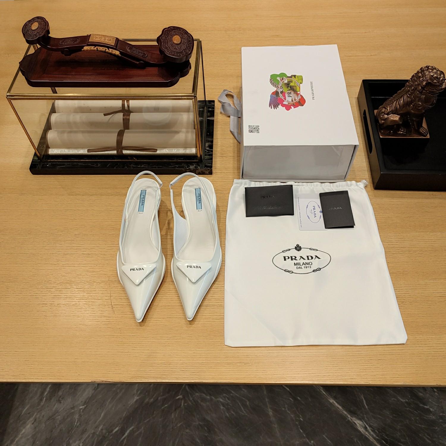 Prada Leather Slingback Pumps - FashionPlug