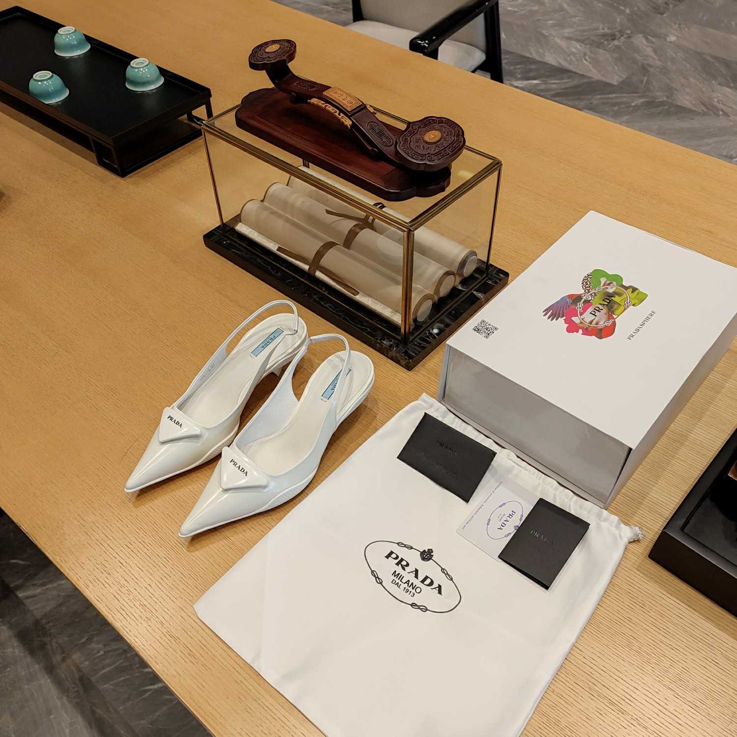 Prada Leather Slingback Pumps - FashionPlug