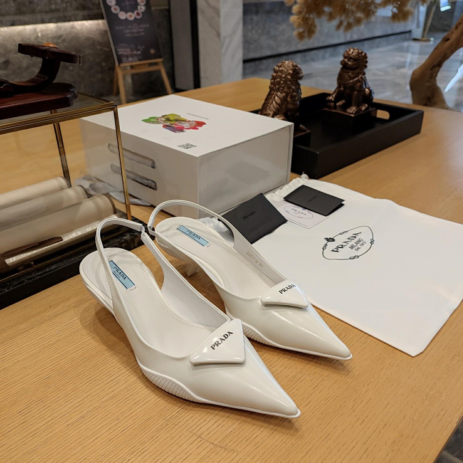 Prada Leather Slingback Pumps - FashionPlug