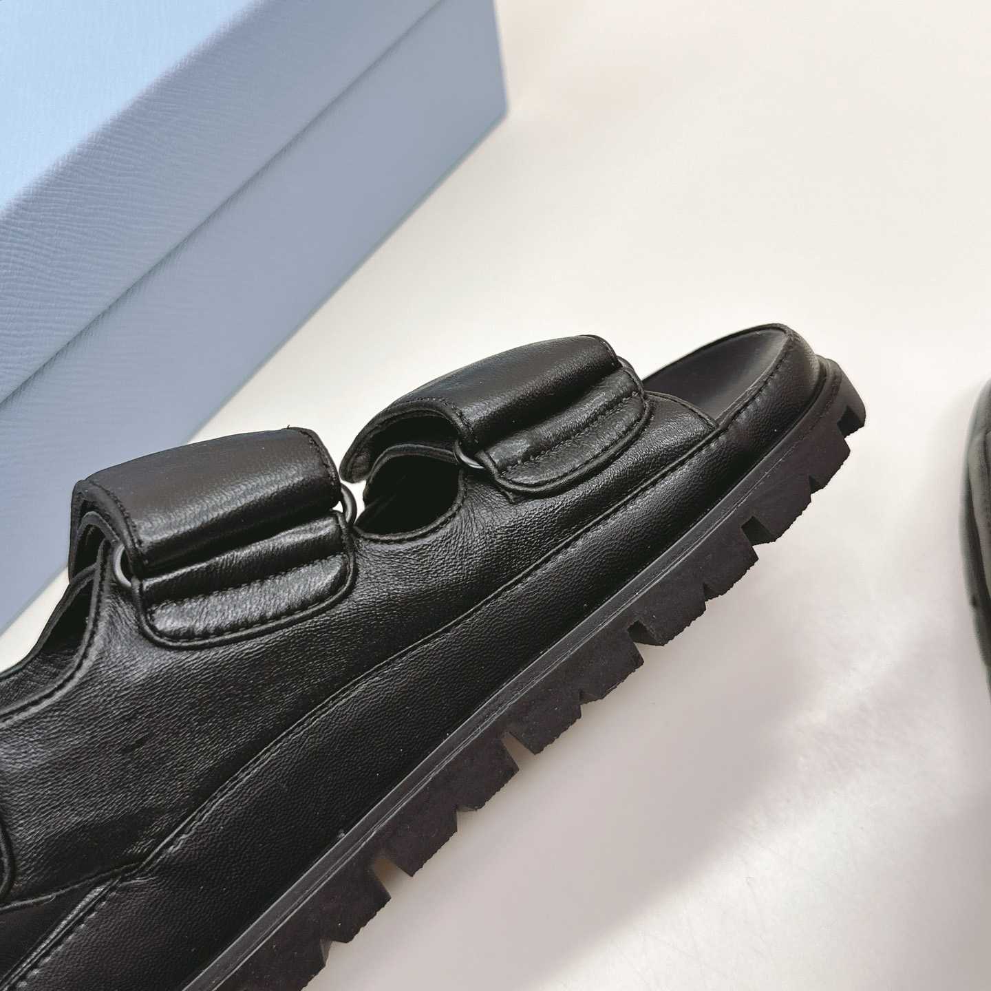 Prada Flat Nappa Leather Sandals - FashionPlug