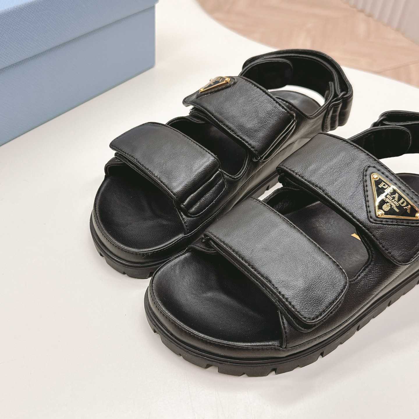 Prada Flat Nappa Leather Sandals - FashionPlug