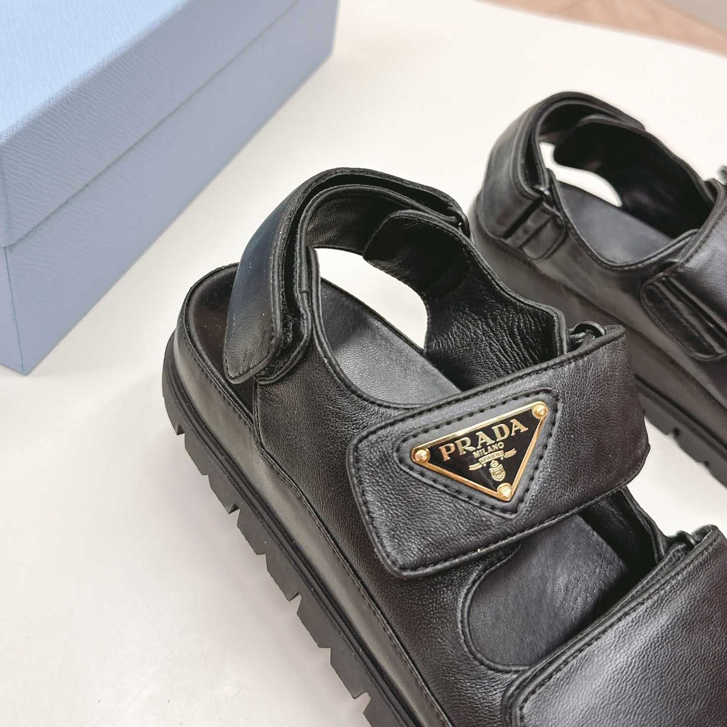 Prada Flat Nappa Leather Sandals - FashionPlug