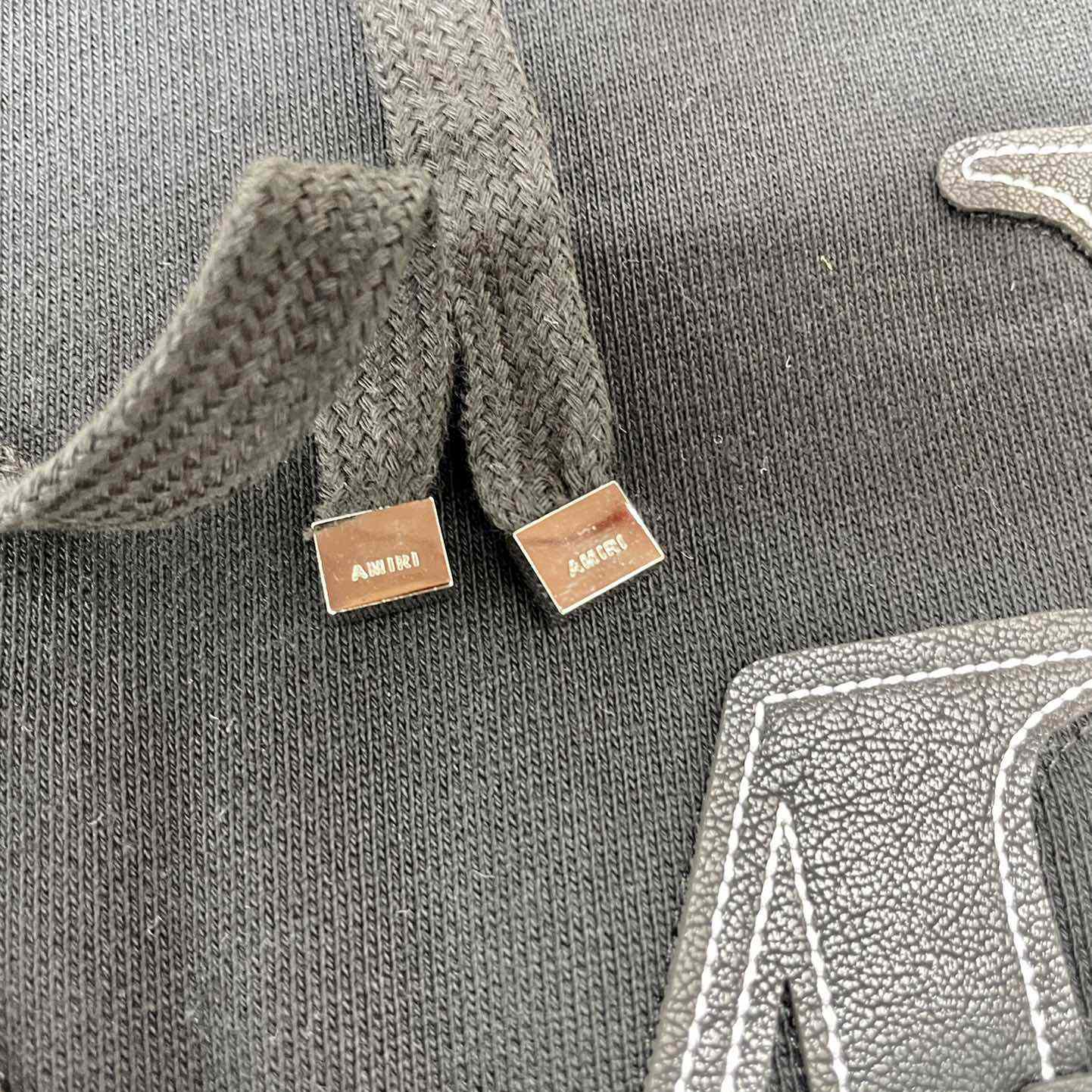Amiri Logo Patch Drawstring Hoodie - FashionPlug
