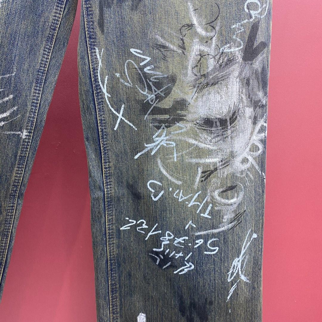 Balenciaga  Graffiti Baggy Jeans - FashionPlug