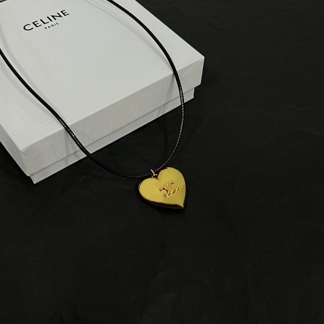 Celine CŒUR Triomphe Necklace In Brass With Gold Finish And Cotton - FashionPlug